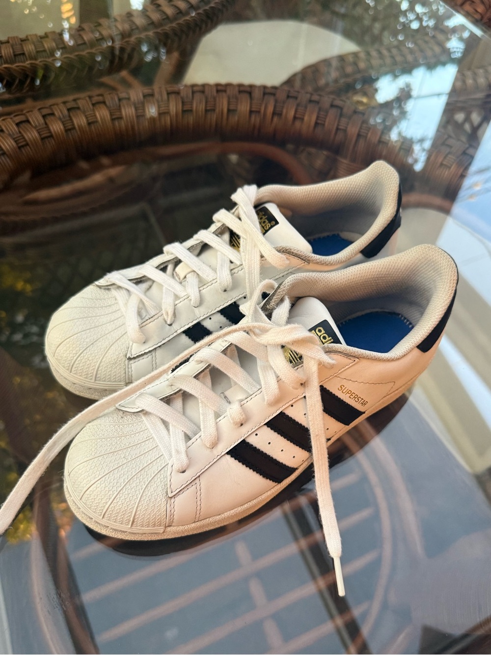 Adidas Superstar Womenβs White and Black Sneakers